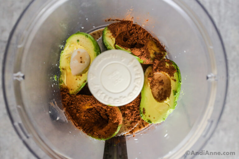 Avocados, chocolate and milk in a food processor.