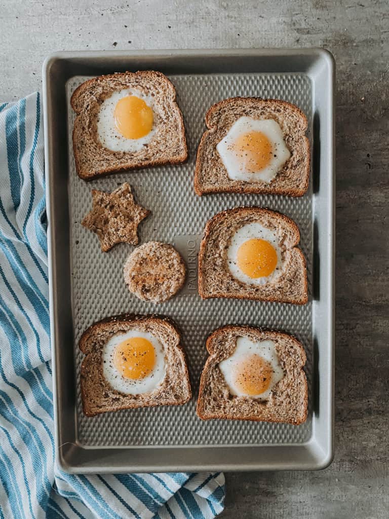 Baked Eggs In A Hole on a baking sheet