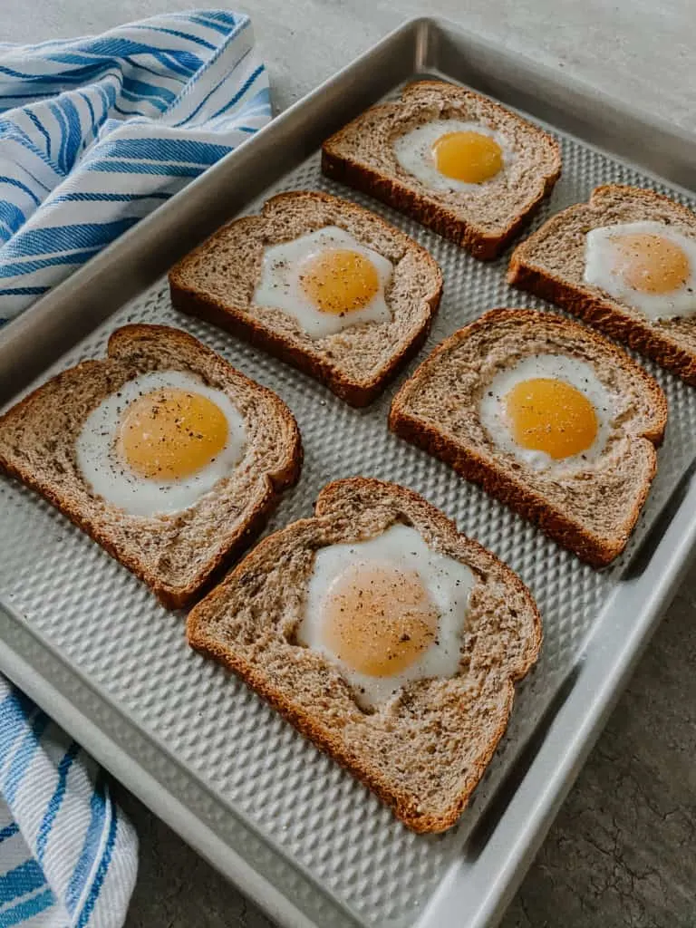 Baked Eggs In A Hole on a sheet pan