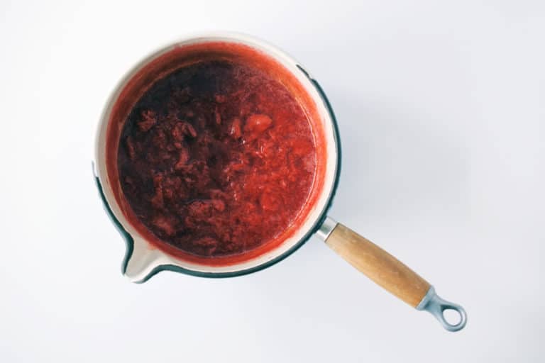 sauce in a pot with wood handle