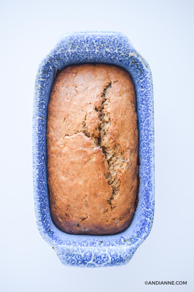 cooked banana bread in blue loaf pan