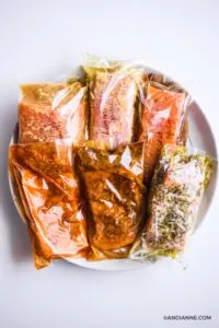 salmon in bags with marinade sauce on a plate