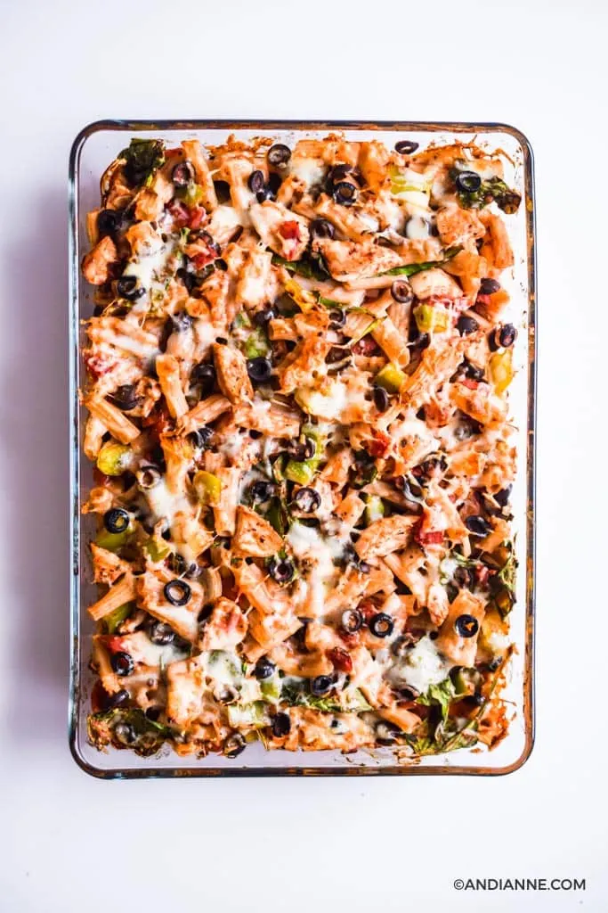 Cooked chicken olive pasta bake in glass casserole dish