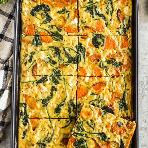 A baking sheet with a sweet potato spinach omelette