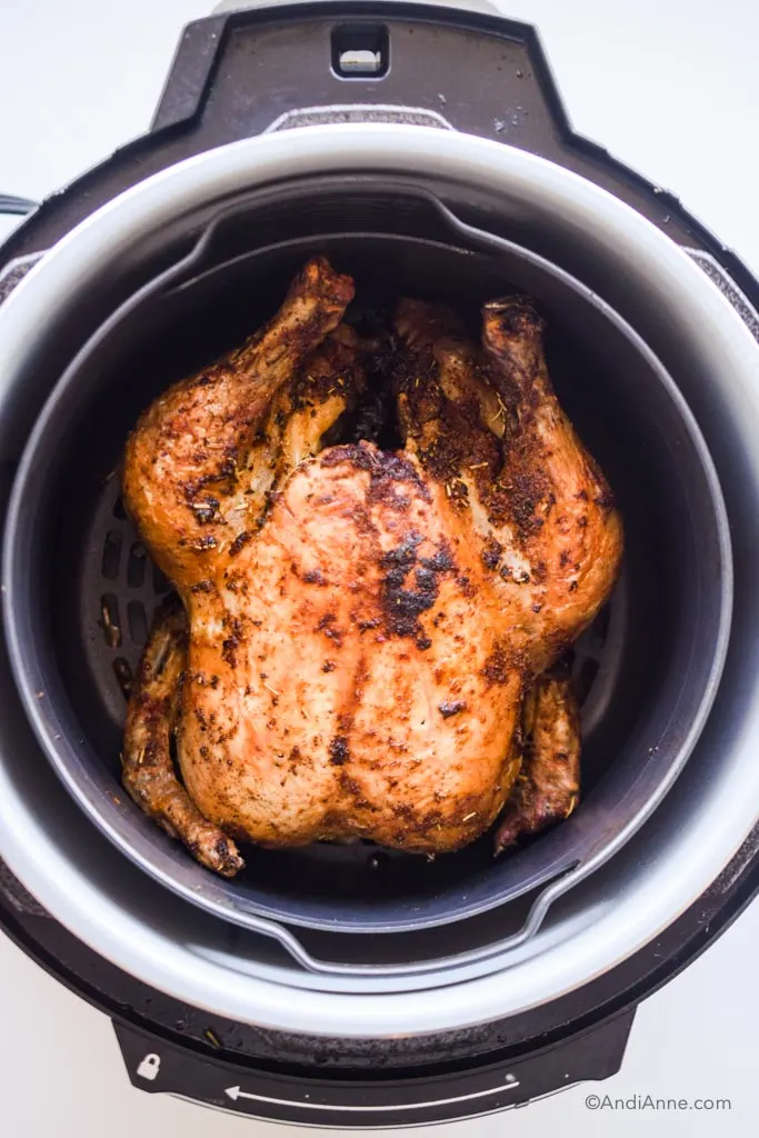 fully cooked chicken inside an air fryer