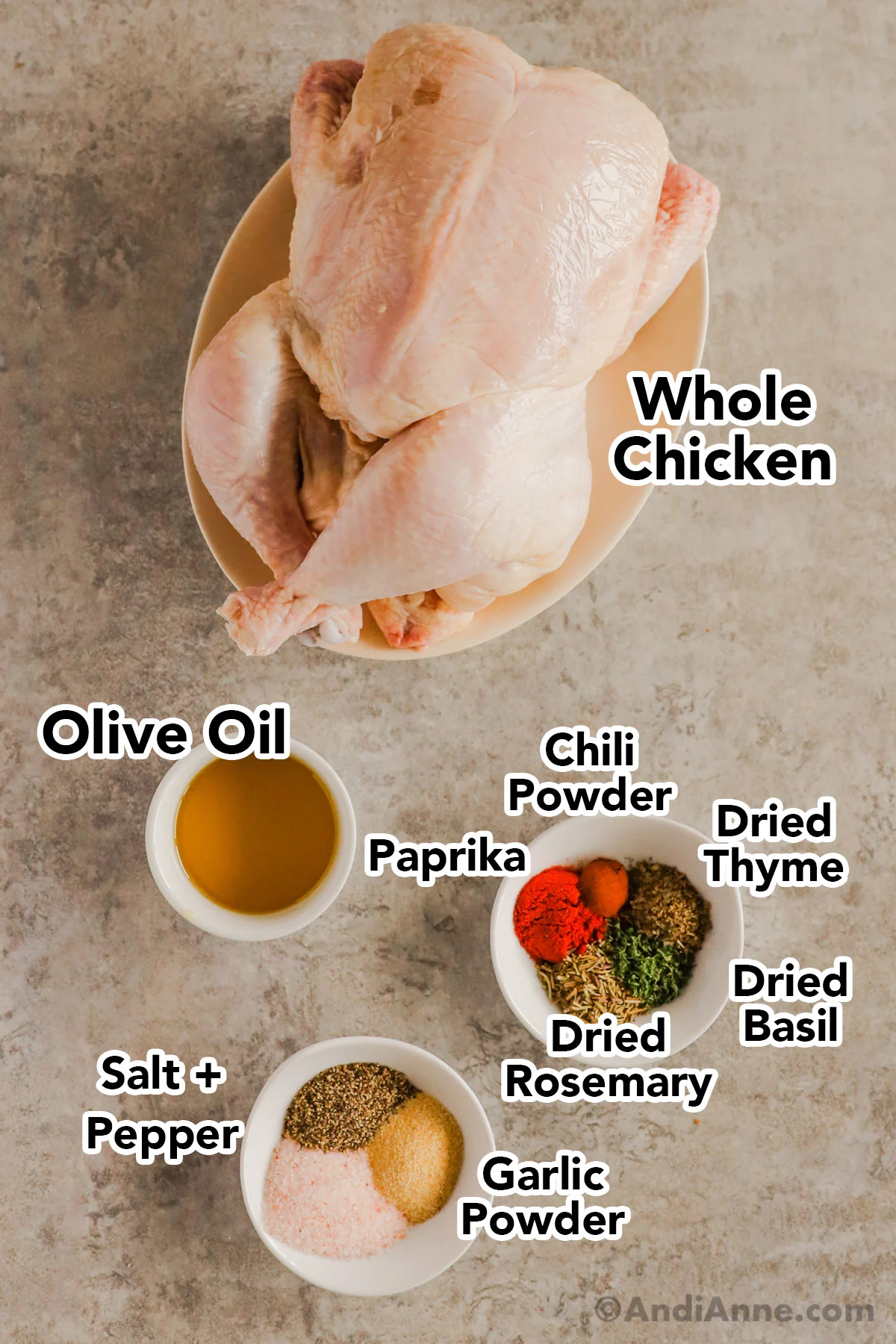 Recipe ingredients including a raw whole chicken, small bowl of olive oil, and two small plates with various spices on them.