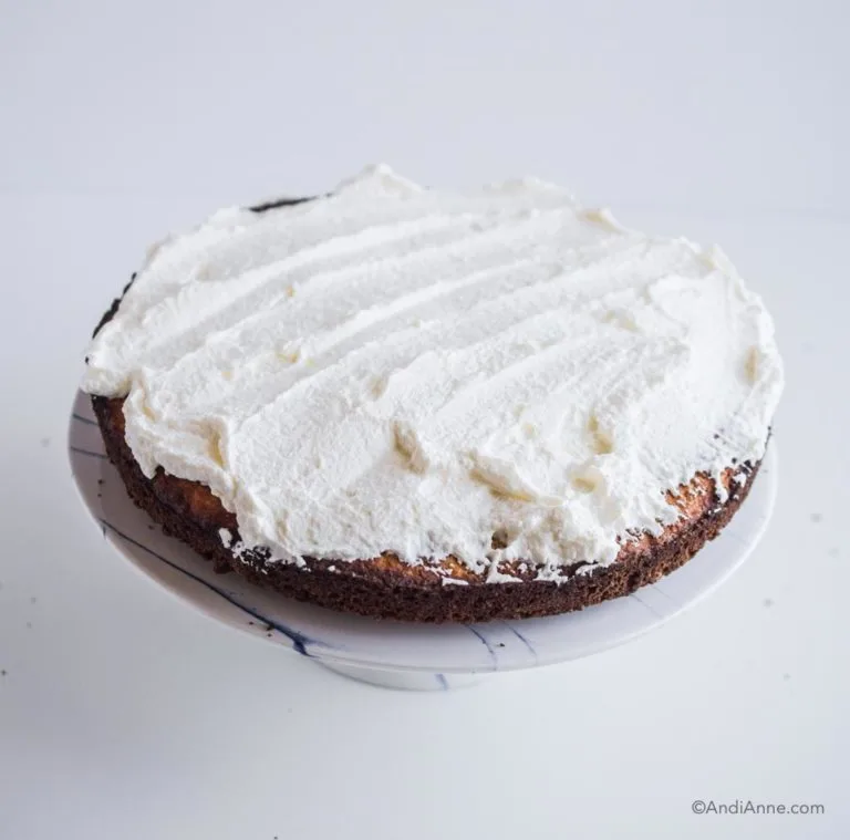 whipping cream on a single layer of cake