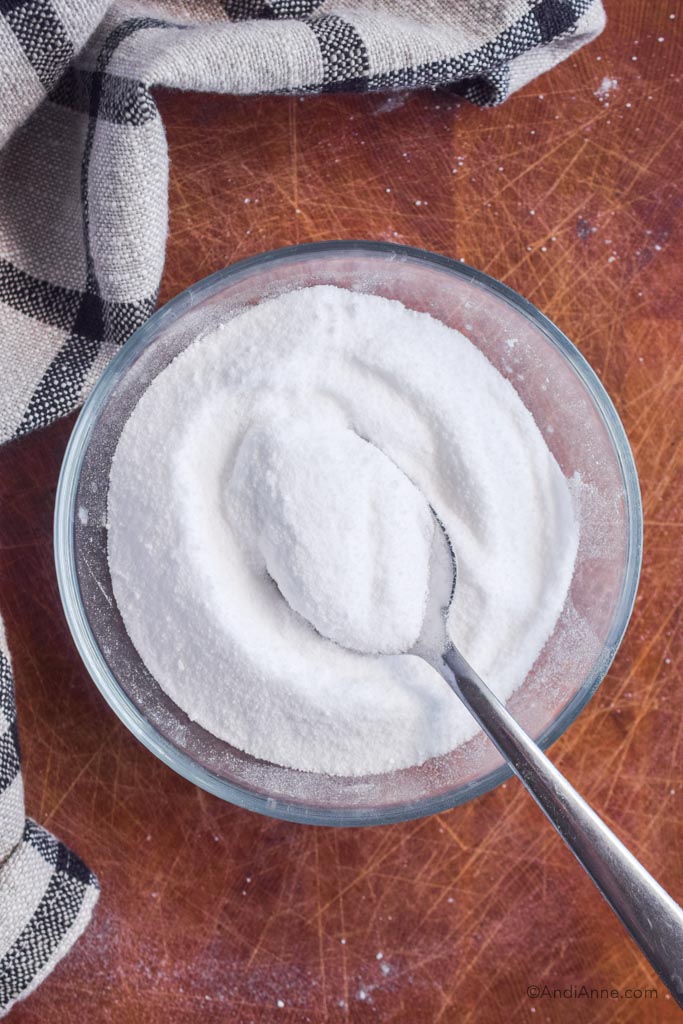 homemade powdered sugar alternative in a bowl with a spoon