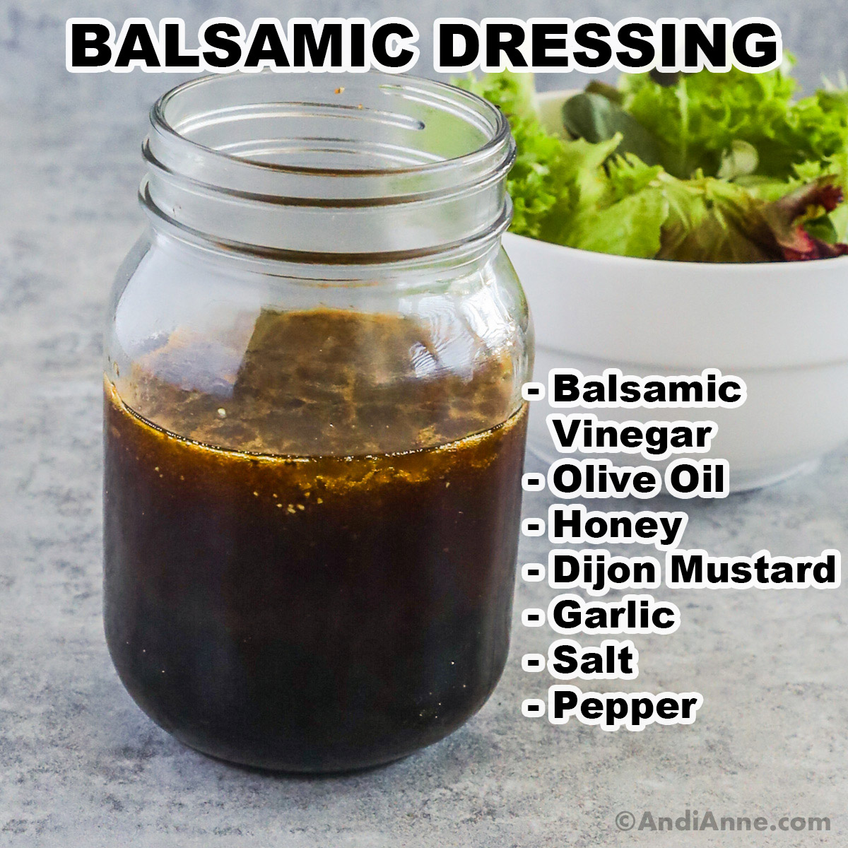 A jar of balsamic dressing with ingredients listed including balsamic vinegar, olive oil, honey, dijon mustard, garlic, salt, pepper.