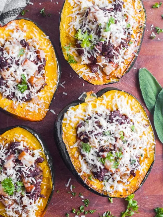 acorn squash stuffed with ground beef, pears and topped with grated cheese