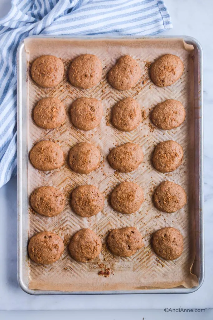 Baking sheet with cookies on it