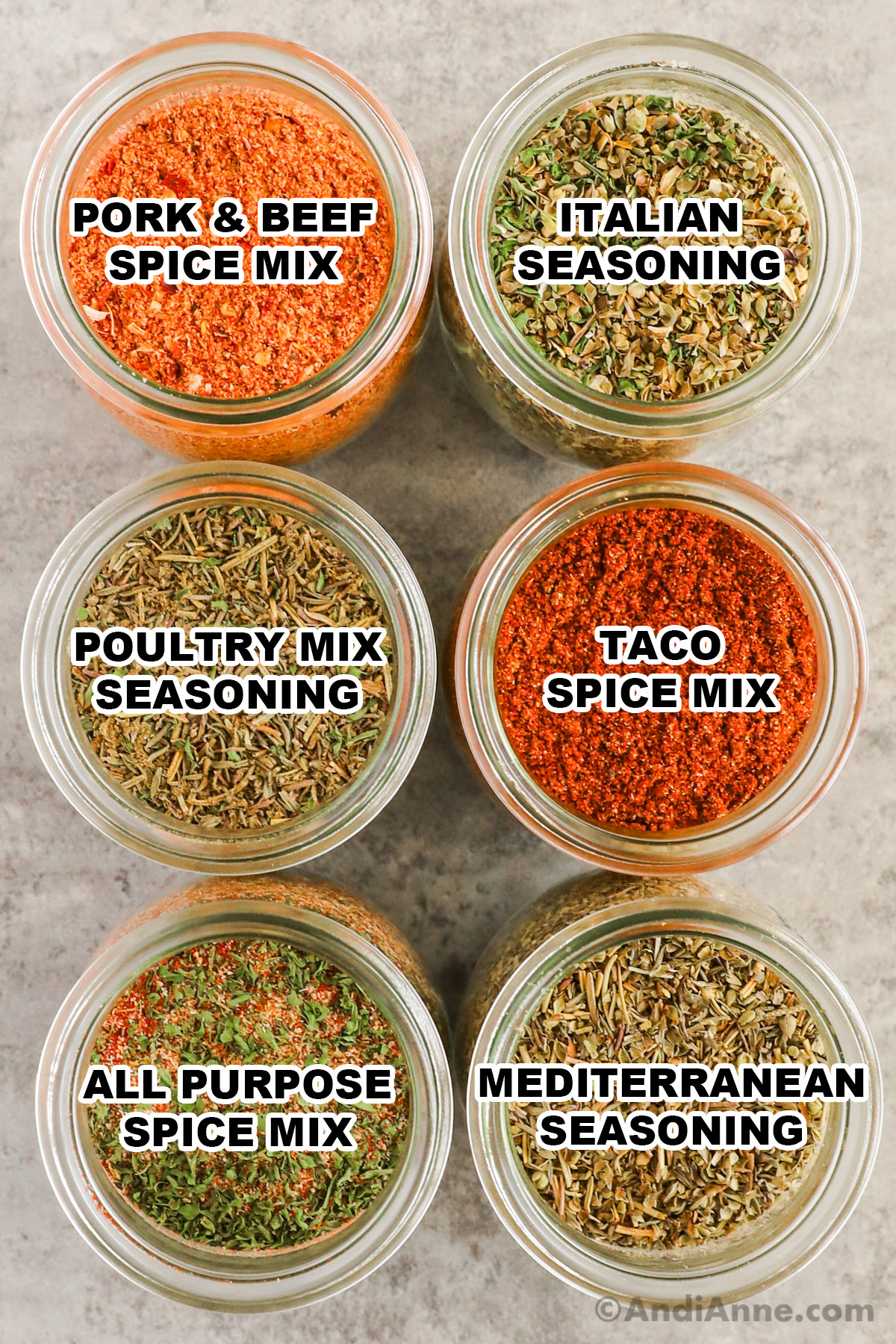 Jars of spice mixes including pork and beef, italian seasoning, poultry mix, taco seasoning, all purpose mix, and mediterranean mix.