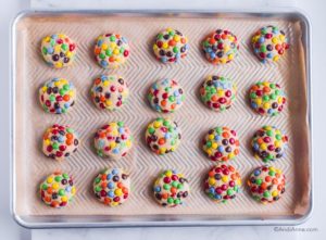 M&M cookies on baking sheet