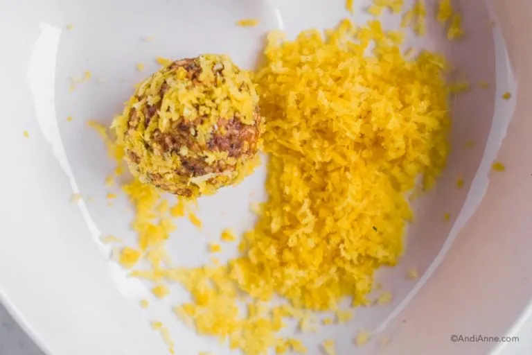 energy ball with lemon zest in bowl