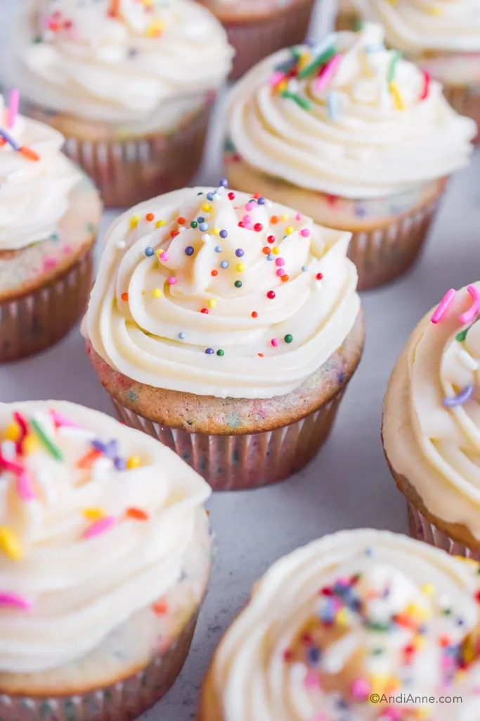 Confetti cupcakes with vanilla icing and nonpareils sprinkles