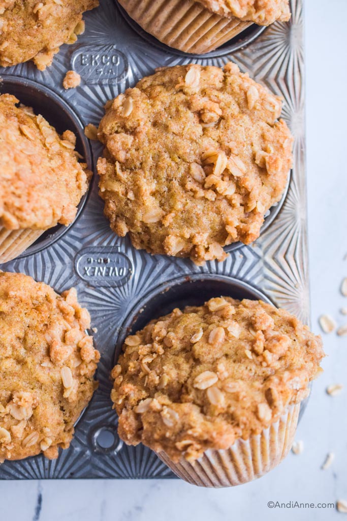 Close up of tops of streusel muffins in vintage ecko baking pan