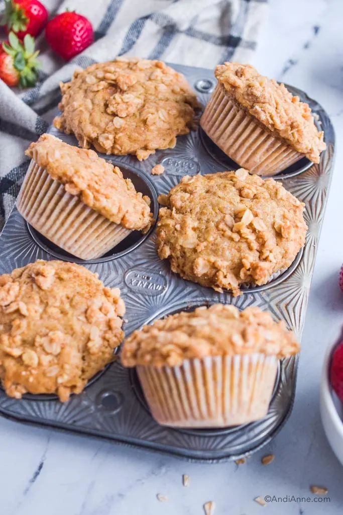 Close up of six wheat streusel muffins in vintage ecko muffin pan.