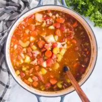 turkey carcass soup recipe in a pot with soup ladle