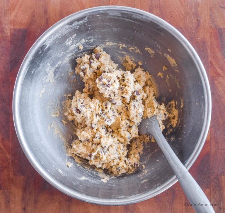 raw cookie batter in steel bowl with spatula