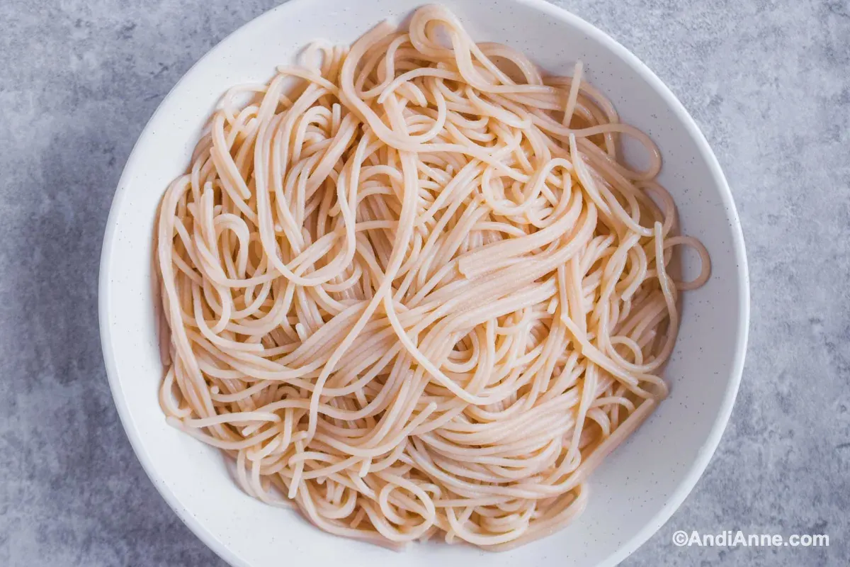 A bowl of cooked spaghetti noodles