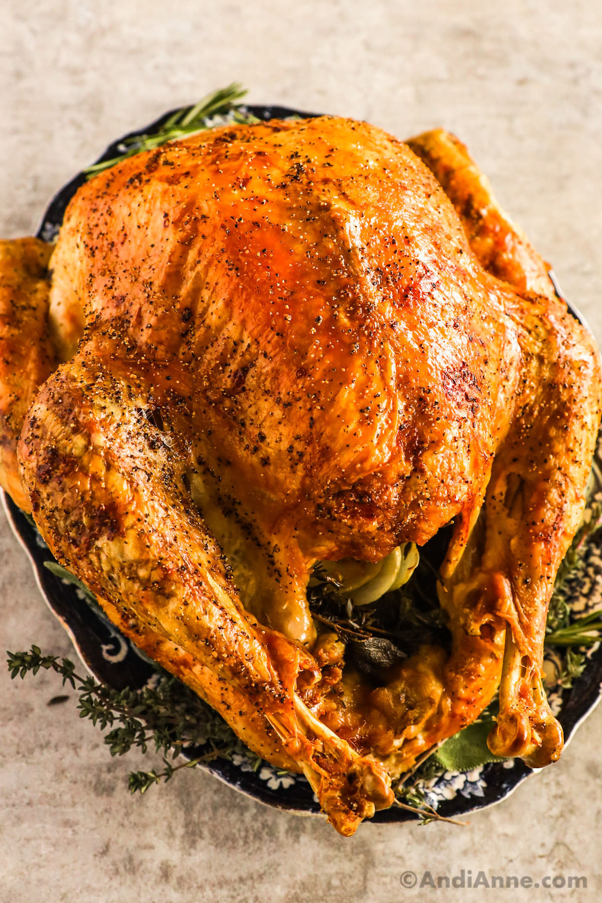 A roasted turkey on a plate.