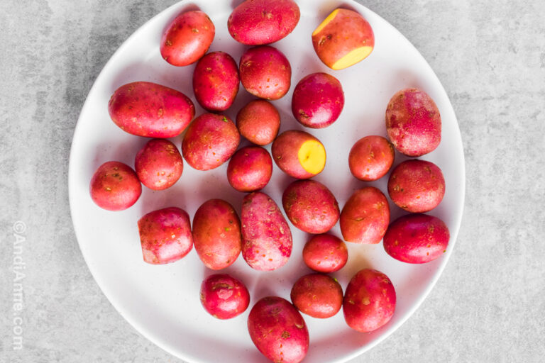 Red potatoes on a white plate.