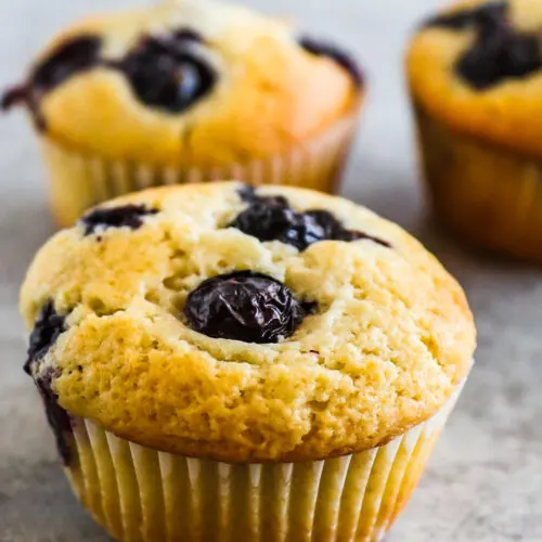 Three blueberry muffins.