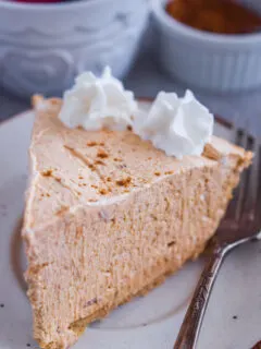 A slice of no bake pumpkin marshmallow pie