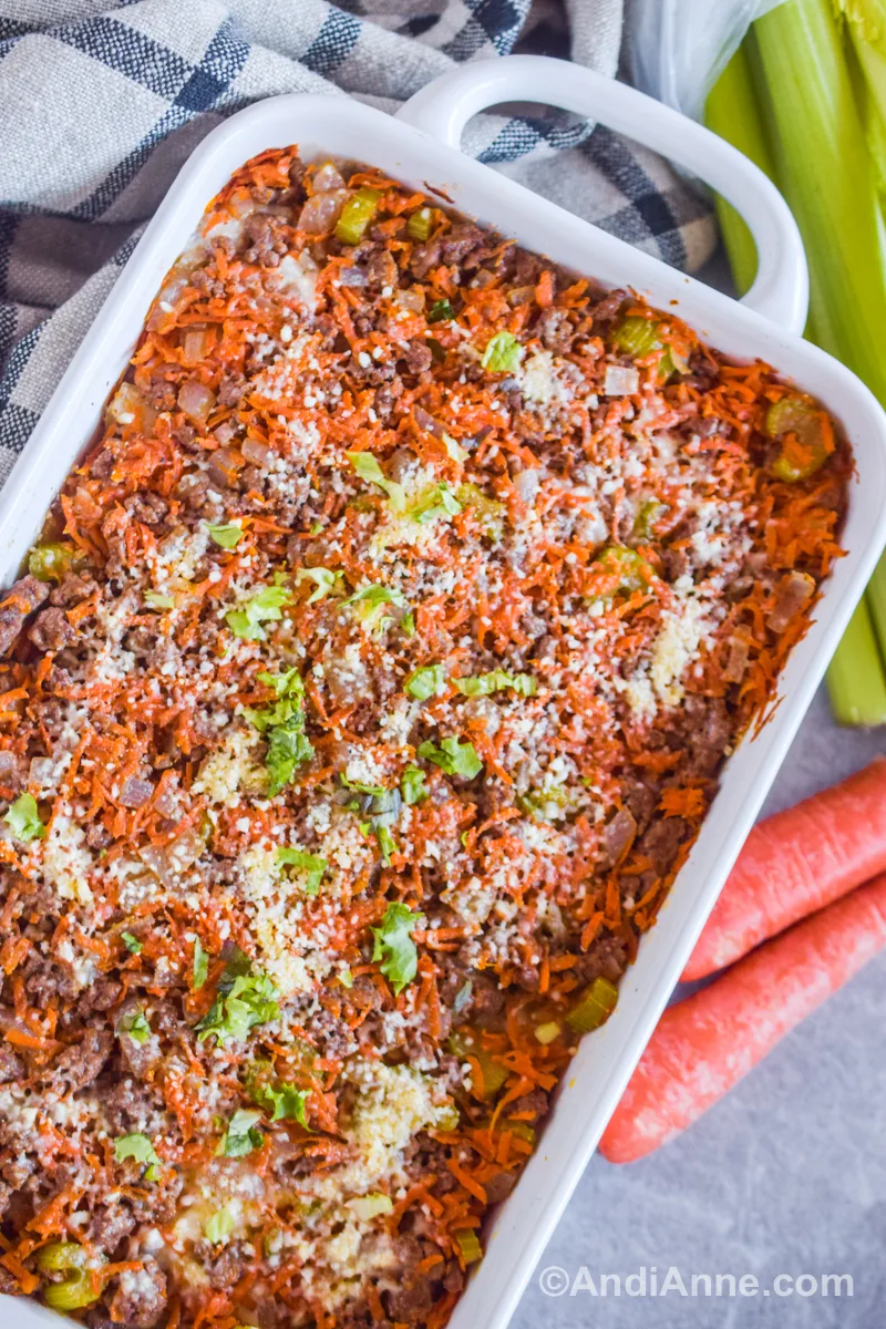 Ground beef mushroom rice recipe in a white casserole dish.