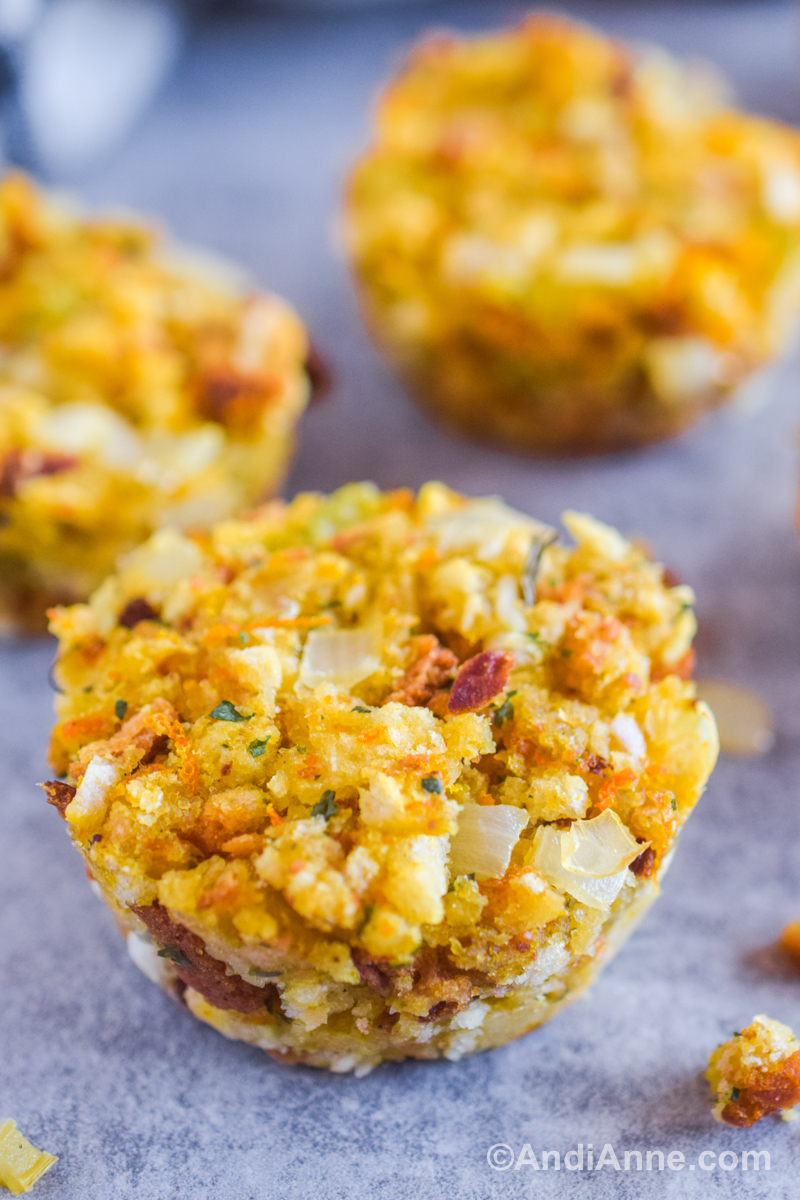Close up of stuffing muffins on the counter.