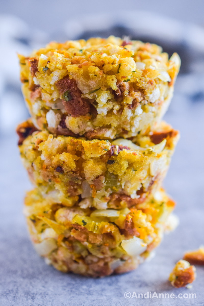 Three stuffing muffins stacked on top of eachother.