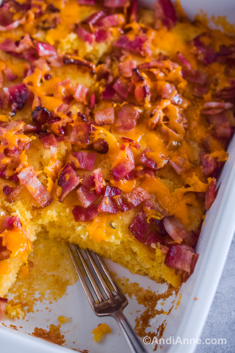 Close up of bacon and cheese pancake casserole recipe with a fork.