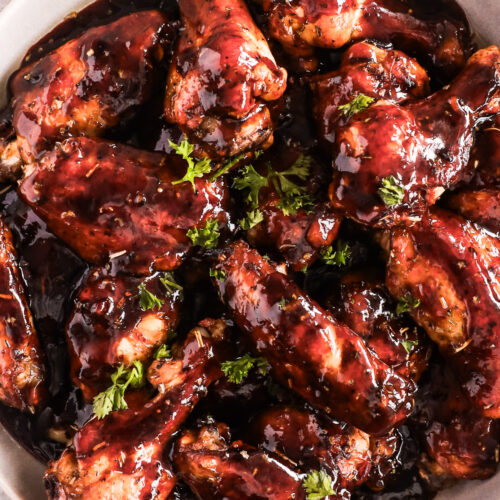 saucy balsamic glazed chicken wings on a plate