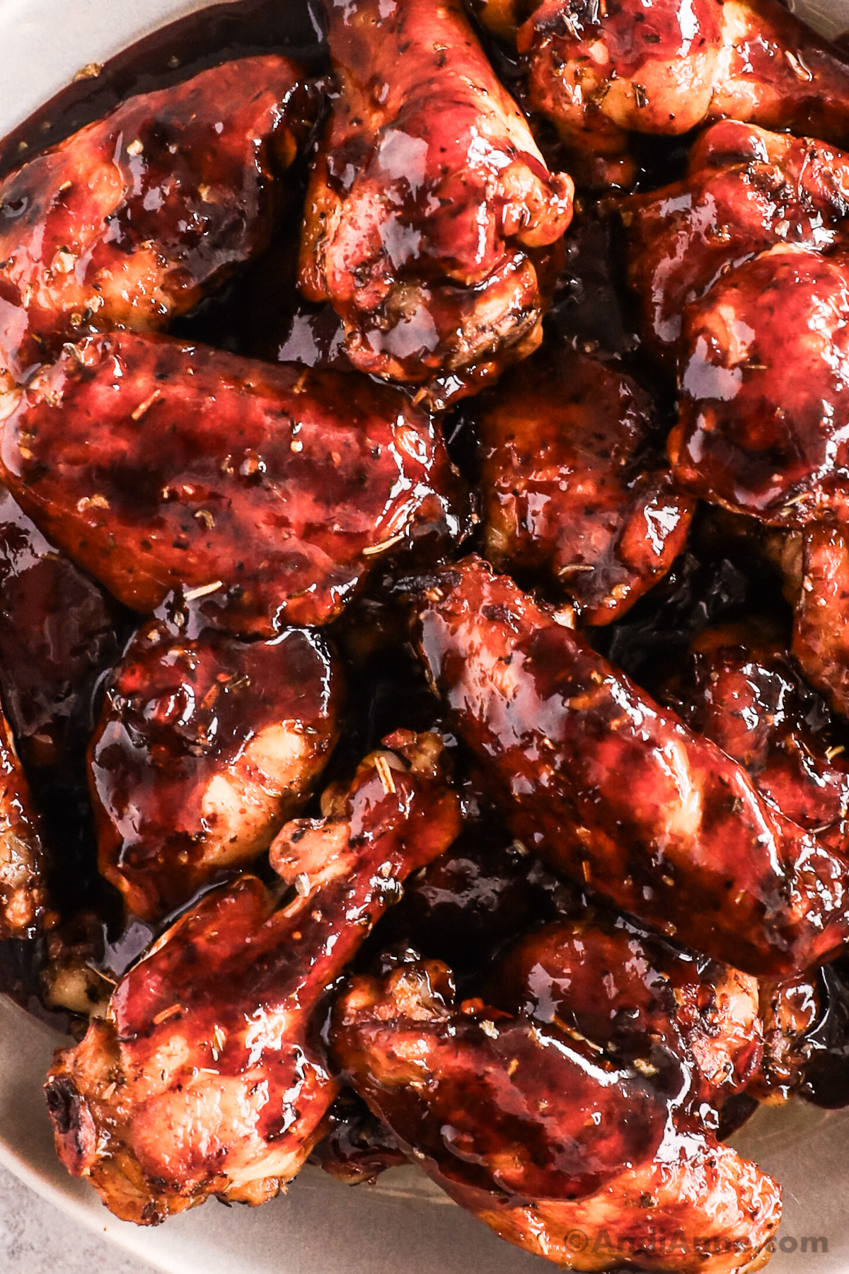 close up of saucy balsamic chicken wings