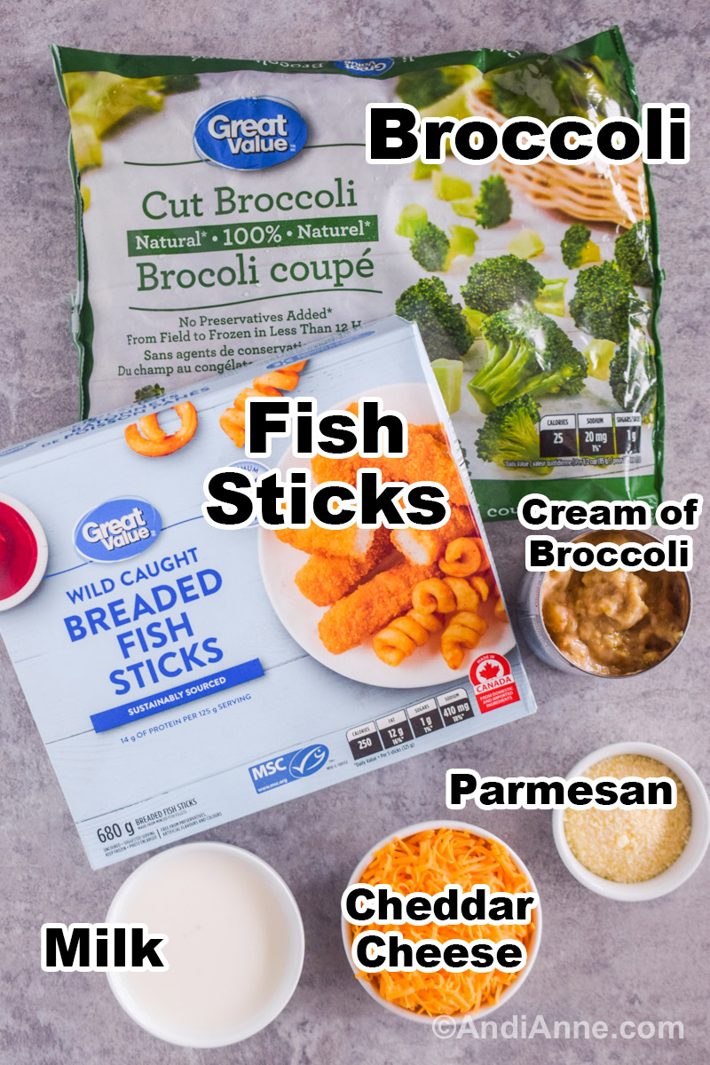 Recipe ingredients including a bag of frozen broccoli, box of breaded fish sticks, cream of broccoli soup can, and bowls of milk, shredded cheddar cheese, and bow of grated parmesan cheese.