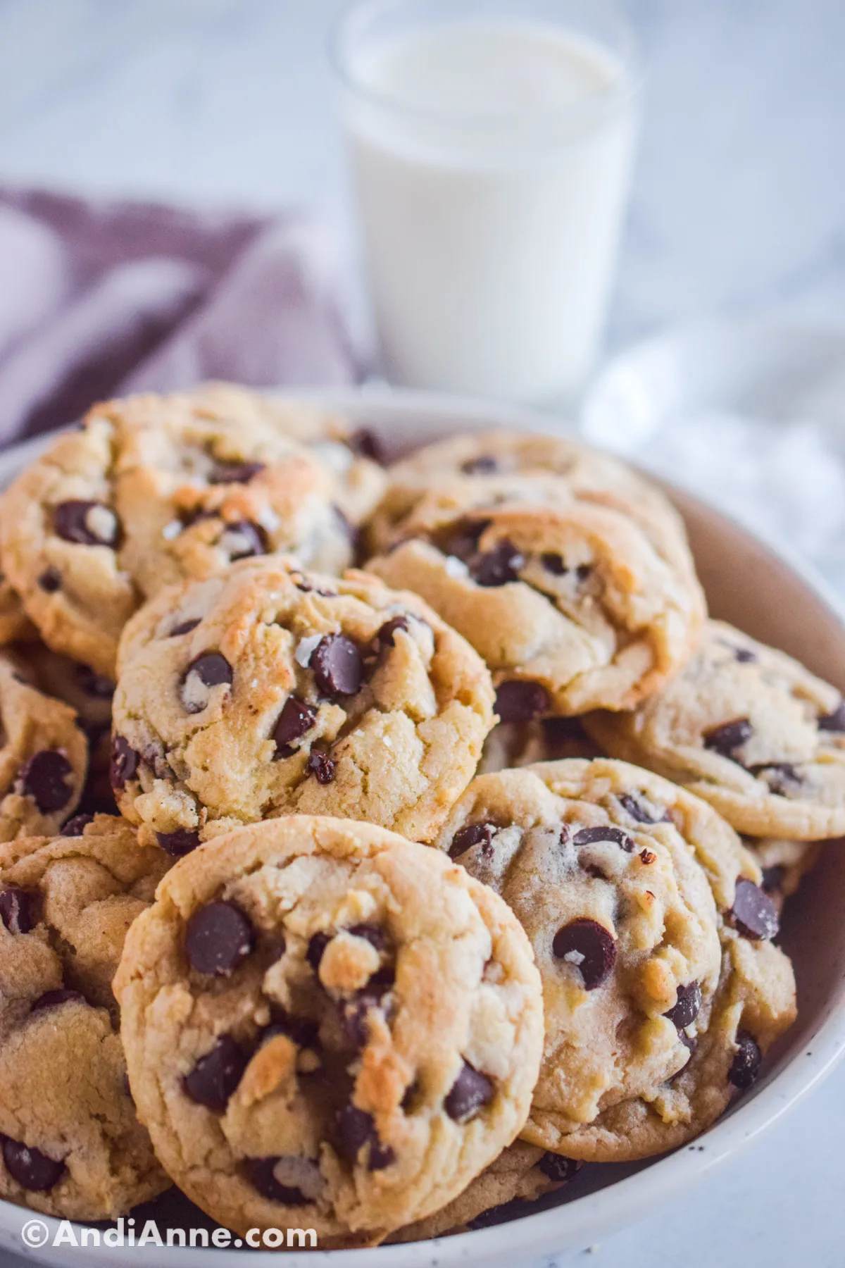 Close up of a bowl of chocolate chip cookies. 
