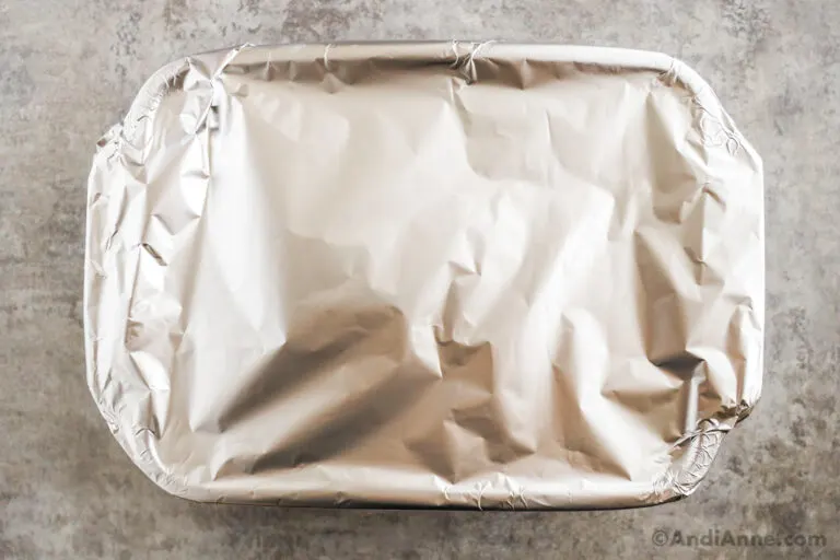 Foil covering a casserole dish.