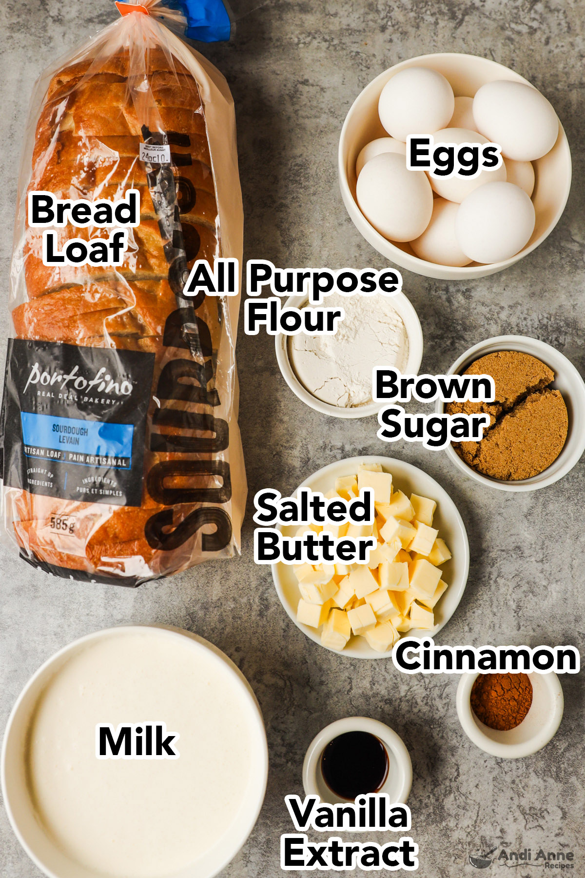 Loaf of bread, Bowls of flour, brown sugar, cubed butter, cinnamon, vanilal extract and milk.