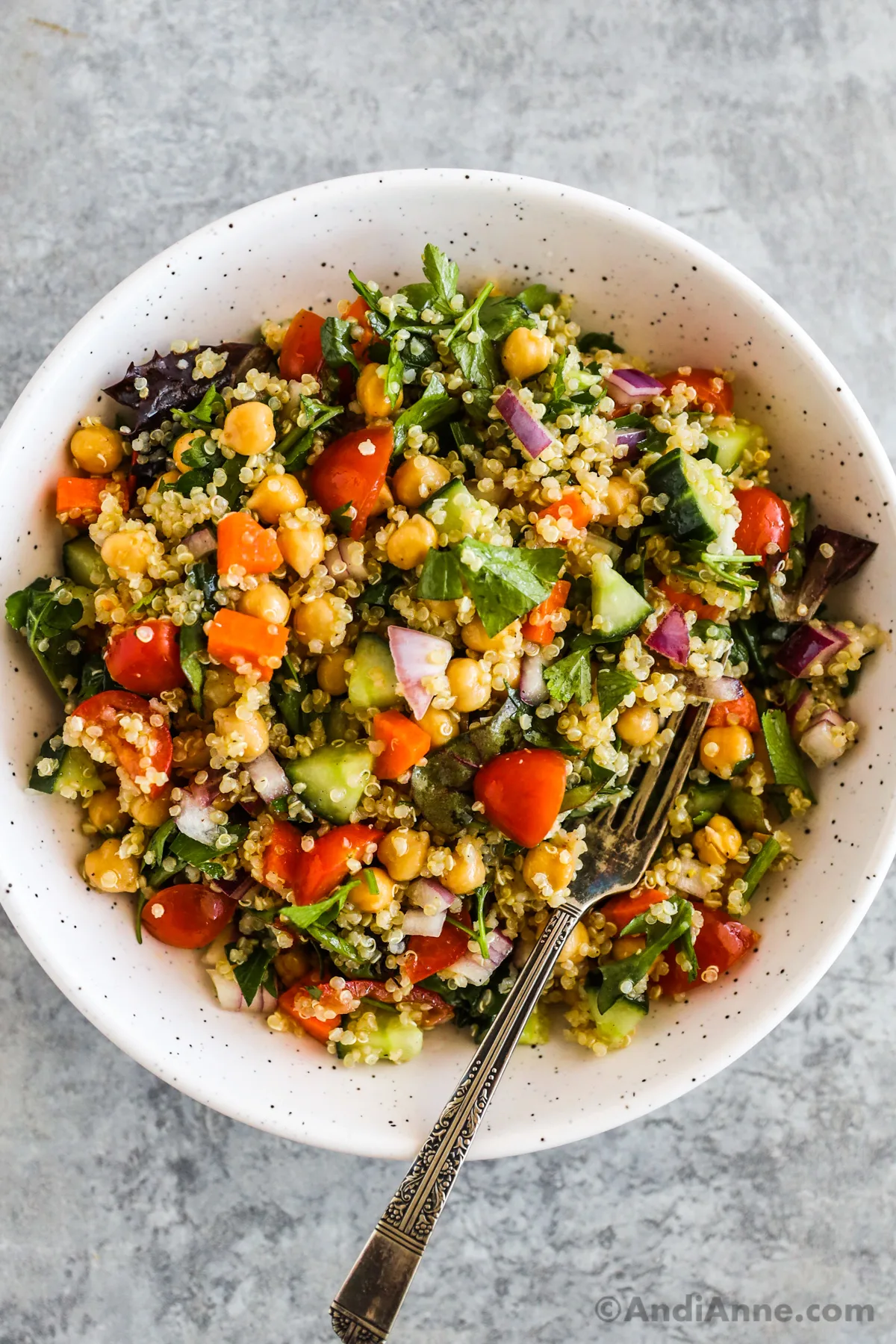 A bowl of quinoa salad.