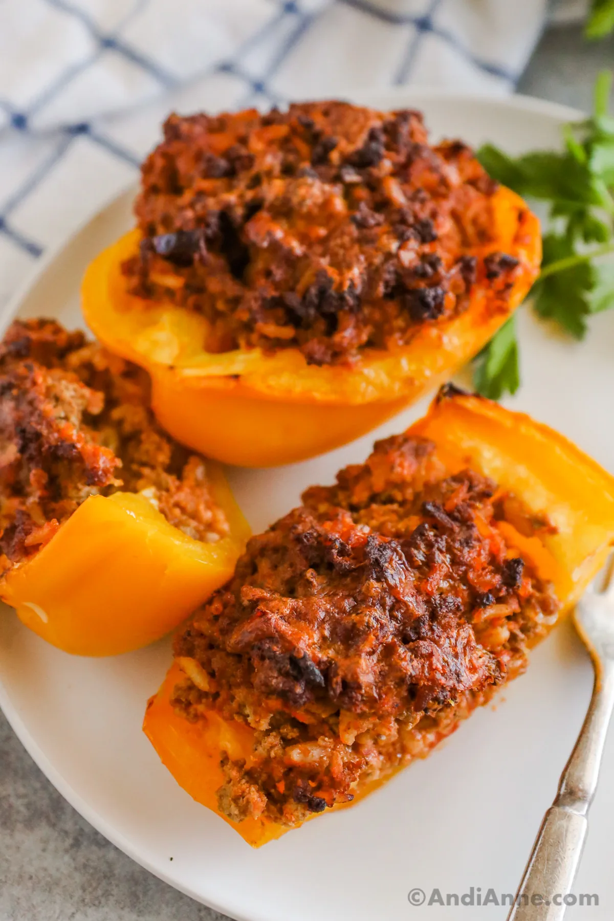 Stuffed bell peppers on a plate.