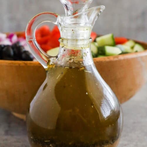 A jar of italian salad dressing.