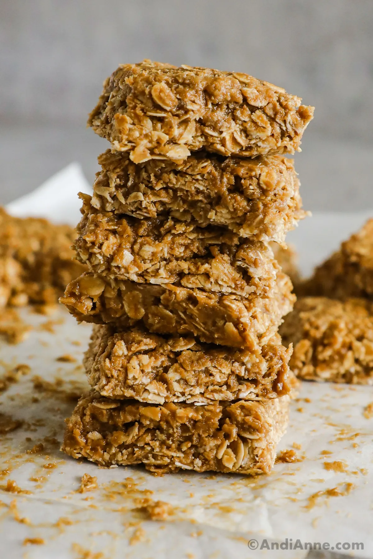 A stack of peanut butter oatmeal bars on top of eachother.