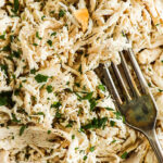 close up of easy fast shredded chicken recipe with a fork