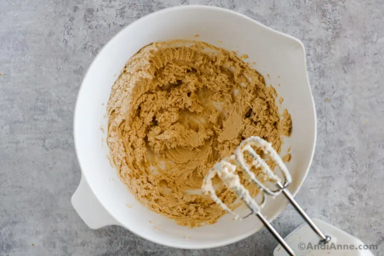Creamed butter and brown sugar in a bowl.