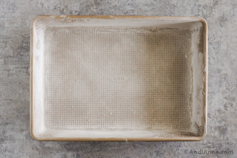 A greased and floured cake pan.