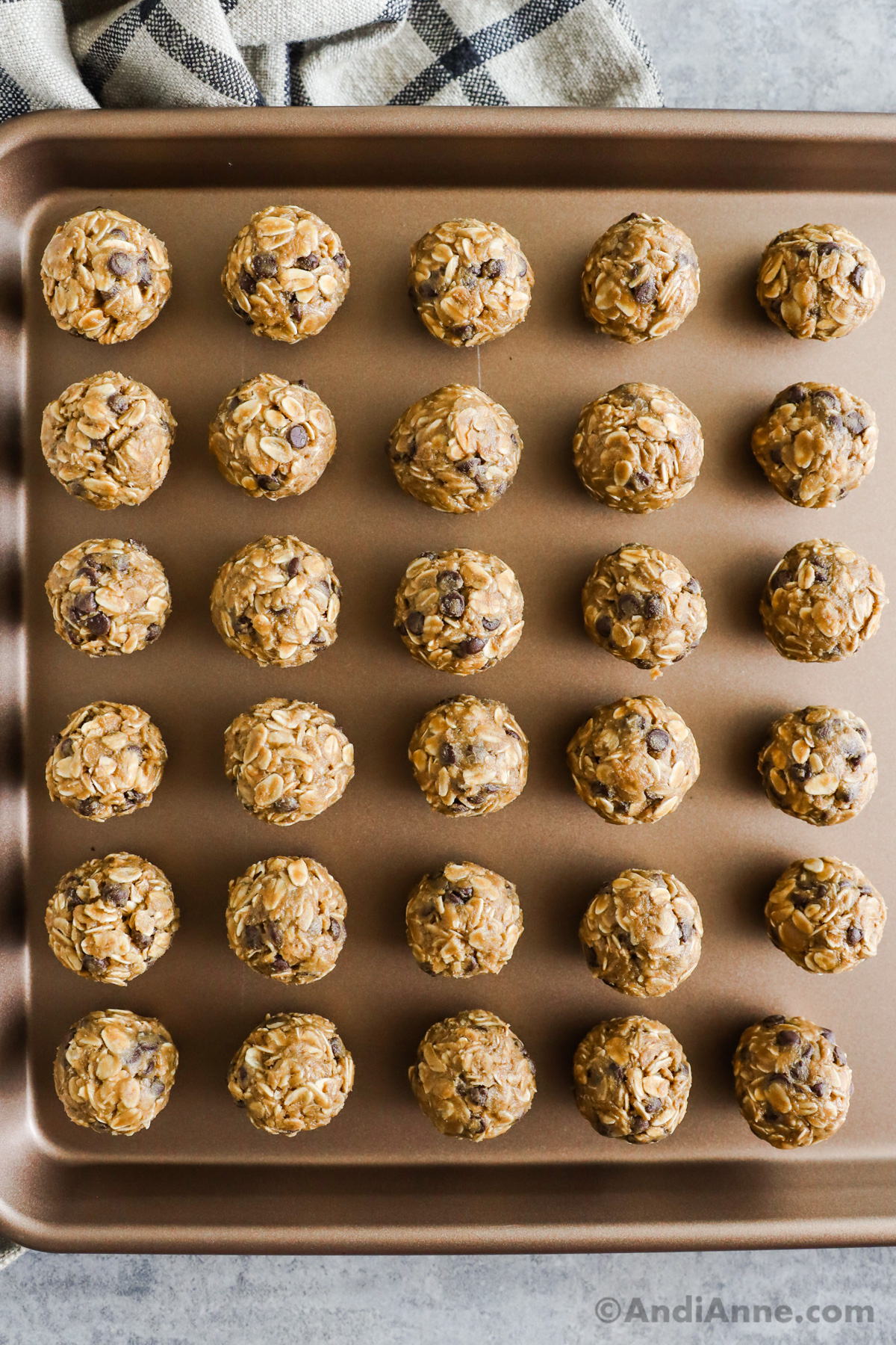 A baking sheet with peanut butter oat balls 