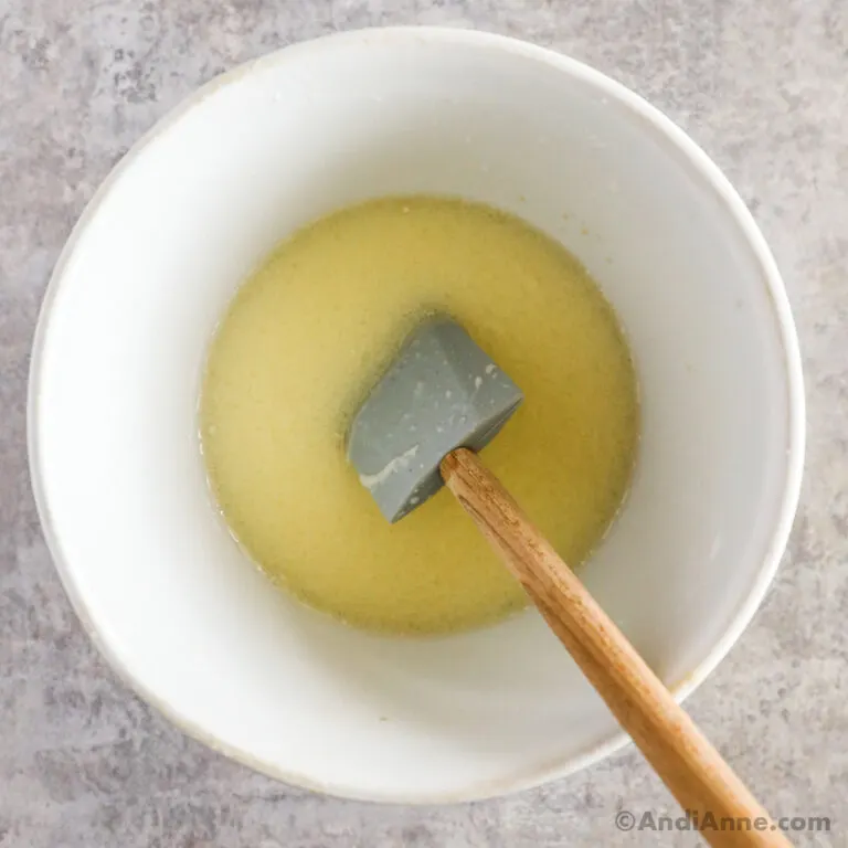 liquid ingredients in bowl with spatula