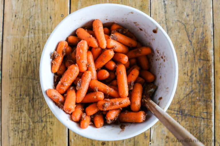 Bowl of carrots tossed in brown sugar sauce