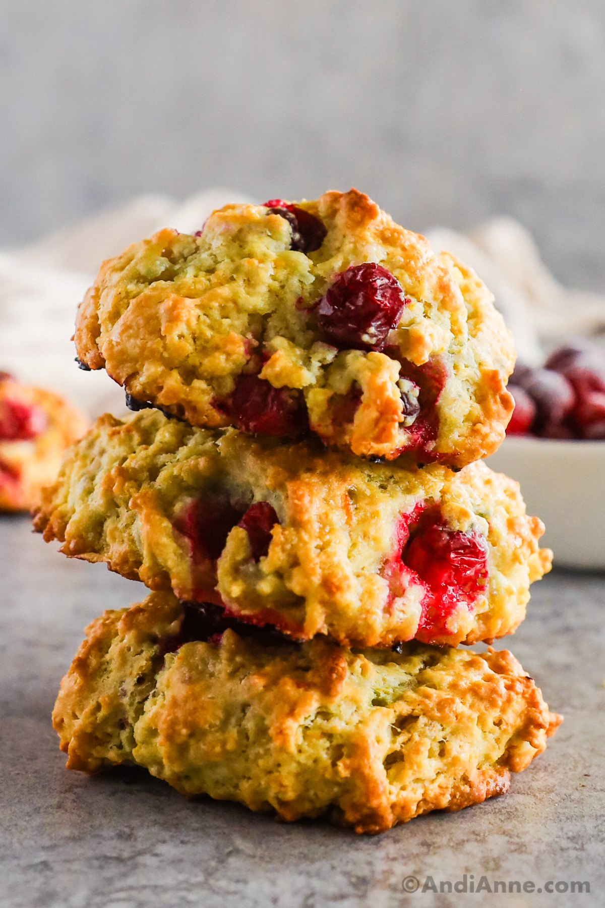 A stack of cranberry scones on top of eachother.