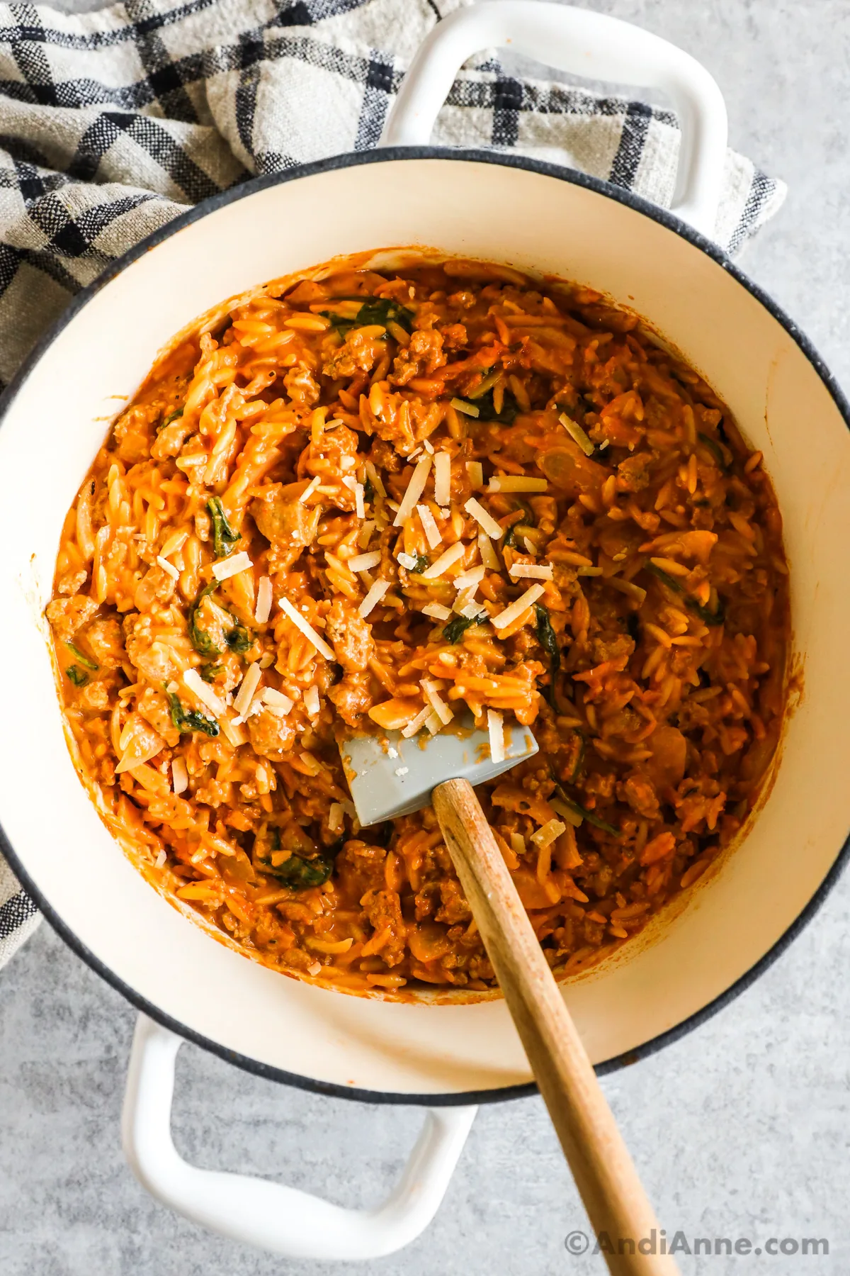 A pot of ground turkey orzo with tomato sauce.